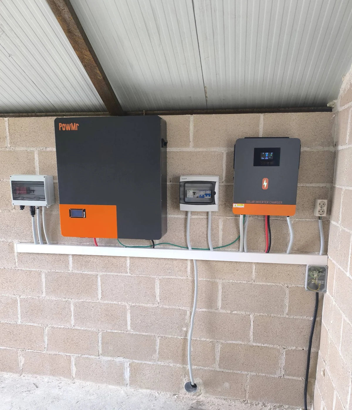 Residential off-grid solar energy storage system with PowMr inverter and wall-mounted lithium battery installation