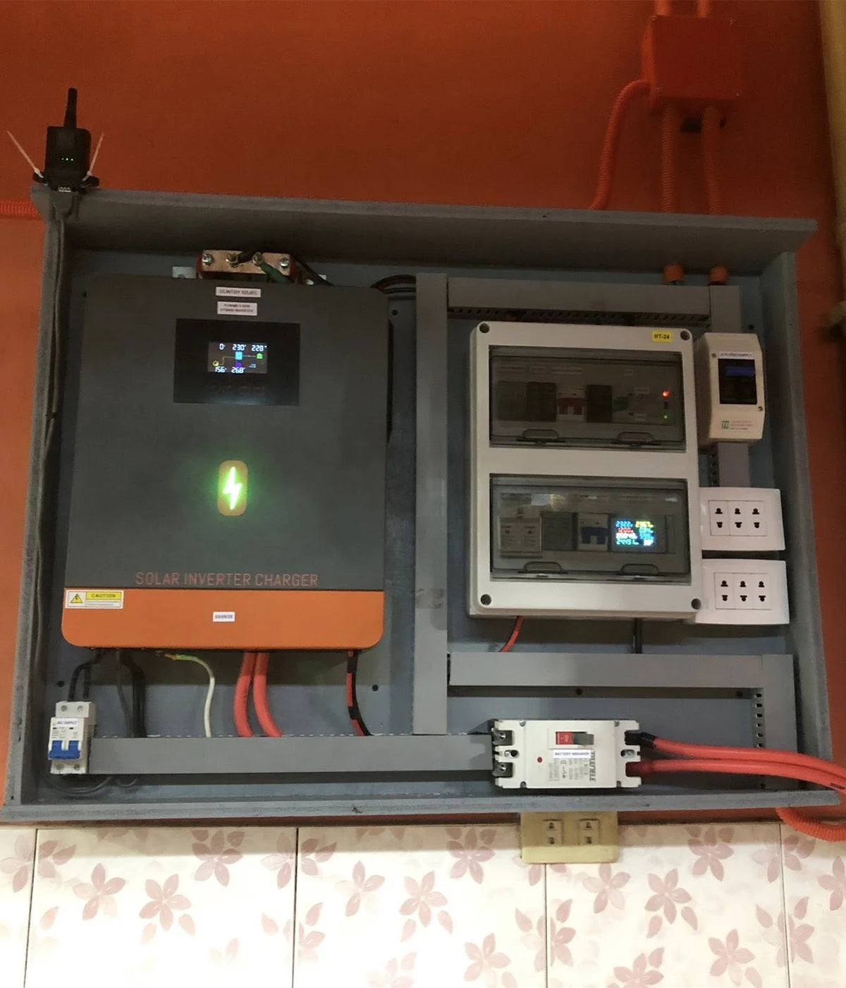 Professional installation of PowMr solar inverter charger and electrical distribution panel for off-grid solar system